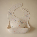 Mushie - Bluey X Mushie Silicone Baby Bib, Bluey Ivory Image 3