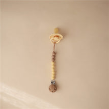 Mushie Eva Pacifier Clip - Muted Yellow Image 2