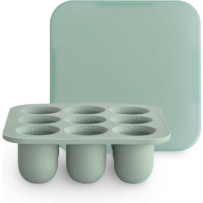 Mushie Fresh Food Feeder Freezer Tray in Cambridge Blue, featuring a tray with six round compartments and a matching lid.