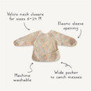 Long sleeve baby bib featuring a floral design, Velcro neck closure, elastic sleeves, machine washable fabric, and a wide pocket.