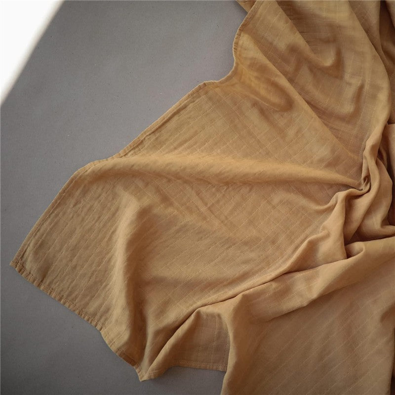 Mushie Organic Cotton Muslin Swaddle Blanket - Fall Yellow Image 3