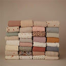 Mushie Organic Cotton Muslin Swaddle Blanket - Soft Mauve Image 6