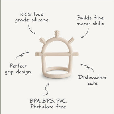 Mushie Silicone No-Drop Sensory Teether in blush, made from 100% food-grade silicone, promotes fine motor skills and is dishwasher safe.