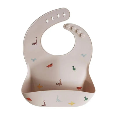 Mushie - Silicone Baby Bib, Dinosaurs Image 1