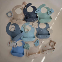 Mushie - Silicone Baby Bib, Planets Image 2
