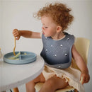 Mushie - Silicone Baby Bib, Planets Image 4