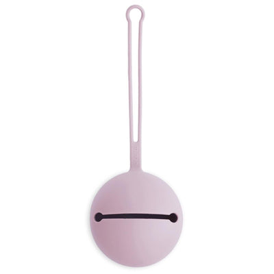 Mushie Silicone Pacifier Holder Case in Soft Lilac color, featuring a round design and a loop attachment for easy carrying.