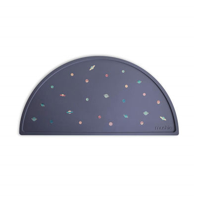 BPA-free silicone placemat with a non-slip design, featuring colorful planet illustrations on a dark background.