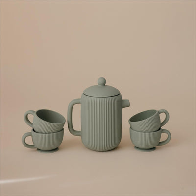Mushie Silicone Tea Play Set in Cambridge Blue with a ribbed teapot and three cups, ideal for imaginative play.