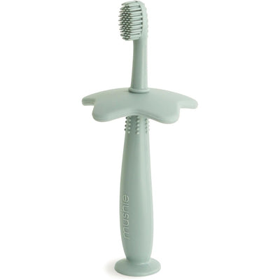 Silicone star-shaped training toothbrush in Cambridge Blue, designed for children with soft bristles and easy grip.