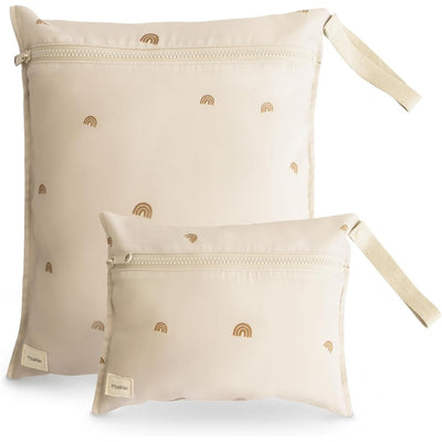 Mushie water resistant wet bags, a set of two in light beige with illustrated rainbows, ideal for storage.