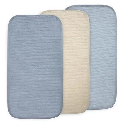 Mushie Changing Pad Liners 3-Pack in blue and beige tones, featuring three quilted pads for baby care.