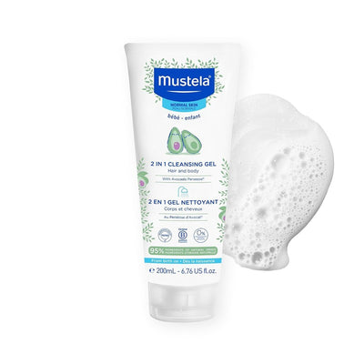 Mustela 2 in 1 Cleansing Gel for baby hair and body with a dollop of white soapy foam.