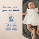 Mustela Cicastela Moisture Recovery Cream advertisement featuring a sleeping baby, highlighting gentle care and product certification details.