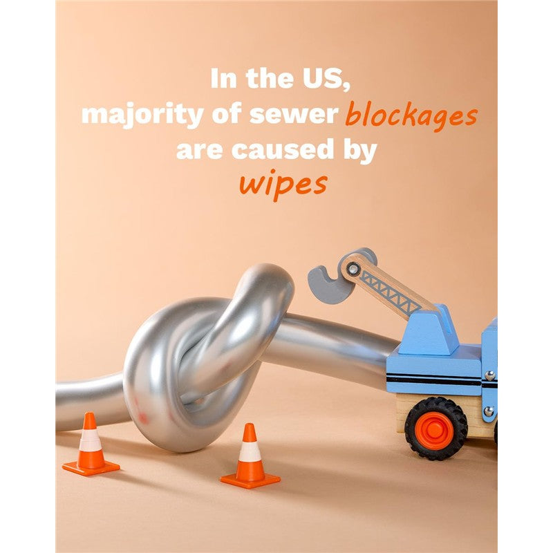 Graphic illustrating a blocked pipe with a toy truck and cones, highlighting that wipes cause sewer blockages.