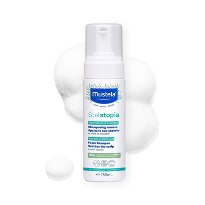 Mustela Stelatopia Foam Shampoo for very dry to atopic skin, 150mL bottle with soap bubbles.