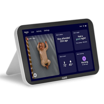Nanit 8” touchscreen display showing a baby asleep. Live status and activity updates are visible on the screen.