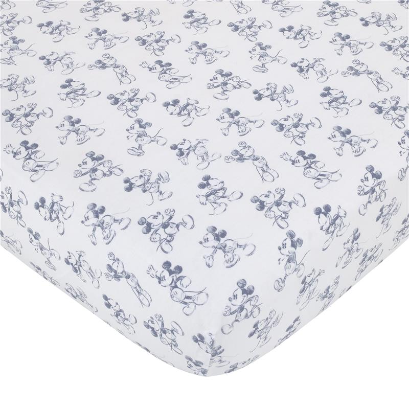 Crib bedding set featuring a white fabric with repeated blue sketch-style Mickey Mouse illustrations.