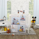 NoJo 3Pk Disney Mini Crib Bedding Set featuring Mickey & Friends with colorful quilt, crib mobile, and plush Mickey.