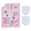 Disney Minnie Mouse Be Happy nursery mini crib bedding set featuring a colorful quilt and two fitted sheets with floral designs.