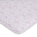 Mini crib bedding set featuring pastel pink Ariel designs, underwater elements, and whimsical patterns suitable for a nursery.