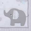 Gray elephant design with a patterned ear on a white crib bedding set, featuring stars and clouds.