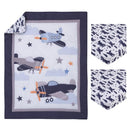 Mini crib bedding set featuring a quilt with plane designs and cloud patterns, plus two fitted crib sheets.