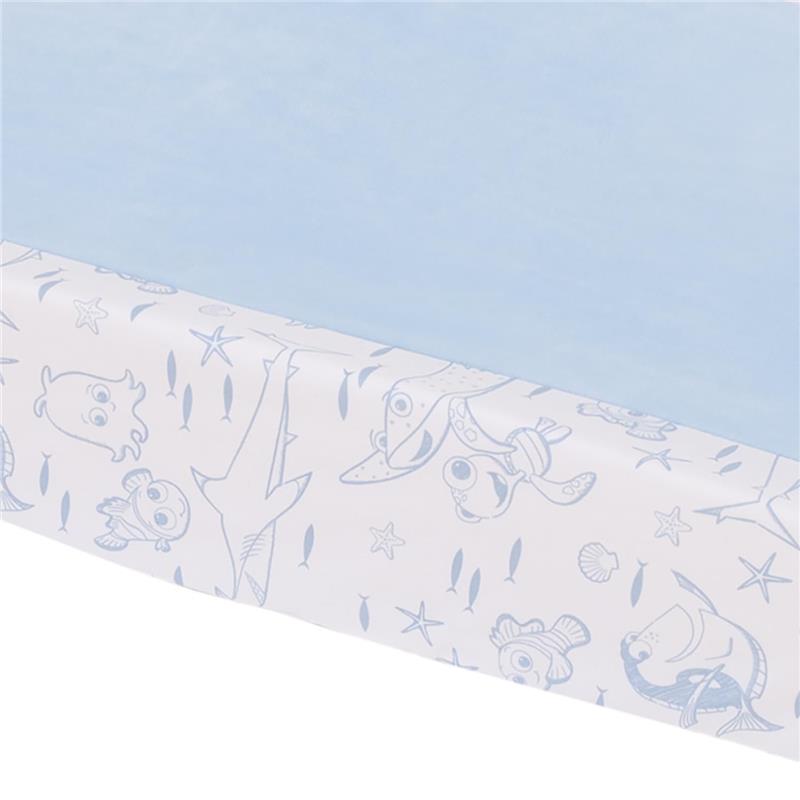 Contoured changing pad cover featuring light blue fabric and whimsical Finding Nemo character designs on the border.