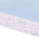 Contoured changing pad cover featuring light blue fabric and whimsical Finding Nemo character designs on the border.