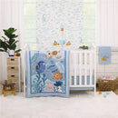 NoJo Disney Finding Nemo plush mobile featuring Nemo and seashells, displayed in a nursery with aquatic-themed decor.
