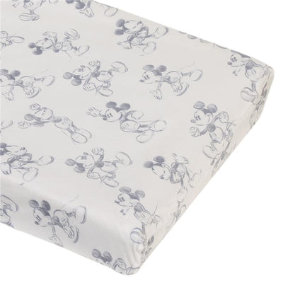 Super soft changing pad cover featuring a playful Mickey Mouse pattern in gray on a white background.