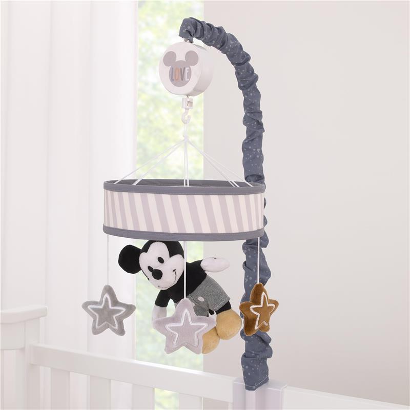 Musical mobile featuring a plush Mickey Mouse, hanging stars, and a gray striped canopy, designed for nursery use.