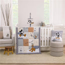 Fitted crib sheet featuring Mickey Mouse and friends, surrounded by playful patterns and soft colors, enhancing a nursery.