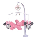Musical mobile featuring pink plush Minnie Mouse heads and bows, designed for baby nursery décor.