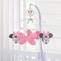 Pink plush Minnie Mouse musical mobile with bows, designed for baby nursery decor, featuring plush characters and soft textures.