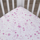 Fitted crib sheet featuring pink and white designs of Disney princesses, hearts, stars, and castles, perfect for nursery decor.