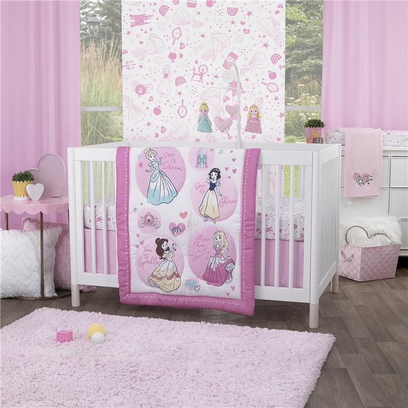Fitted crib sheet featuring Disney princesses, hearts, and stars in pink and white for a nursery setting.
