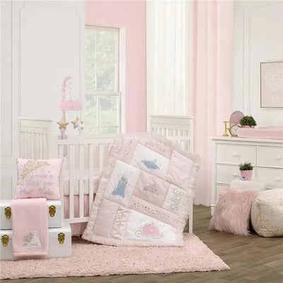 Changing pad cover featuring Disney Princess designs in pink and pastel colors, shown in a nursery setting with a crib and decor.