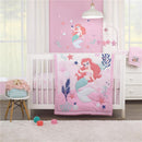 Nojo Disney The Little Mermaid Musical Mobile in a nursery with a pink quilt featuring Ariel and decorative elements.