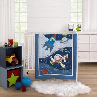 Buzz Lightyear bedding set featuring a comforter with space-themed designs, including rockets and planets, in blue and gray.