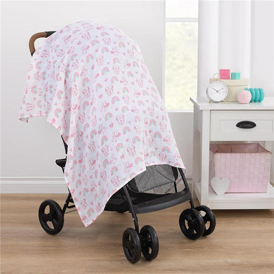Minnie Mouse printed muslin swaddle covering a stroller, with pink and rainbow patterns visible.