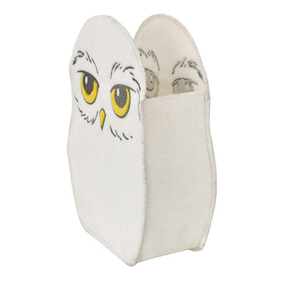 Felt storage bin designed as Hedwig, featuring large yellow eyes and a white owl design. Ideal for organizing items.