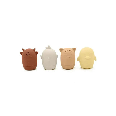 Four farm animal bath toys in pastel colors: a brown cow, a white chicken, a pink pig, and a yellow chick.