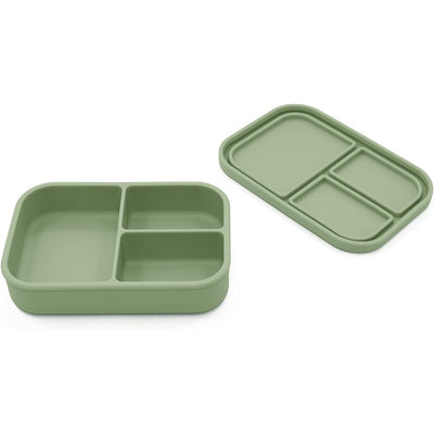 Small silicone snack box in leaf green, featuring compartments for portion control, with a matching lid.