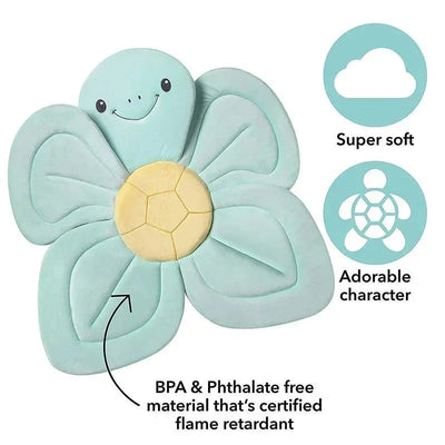 Nuby Bathing Turtle Baby Bath Sink Insert in soft teal, shaped like a flower with a smiling turtle face, made from BPA-free material.