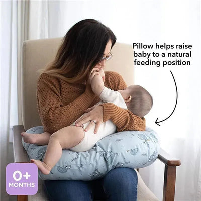 Nuby Dr Talbots Dog Print Nursing Pillow supports a mother feeding her baby, promoting a natural positioning.