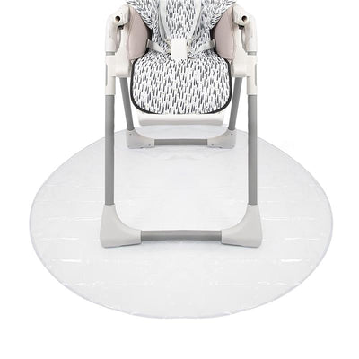 Nuby High Chair Waterproof Floor Mat 50 under a high chair, featuring a clear, circular design for easy cleaning.