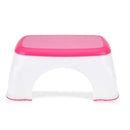 Nuby Step Up Stool in pink and white, designed for children to reach higher surfaces safely.