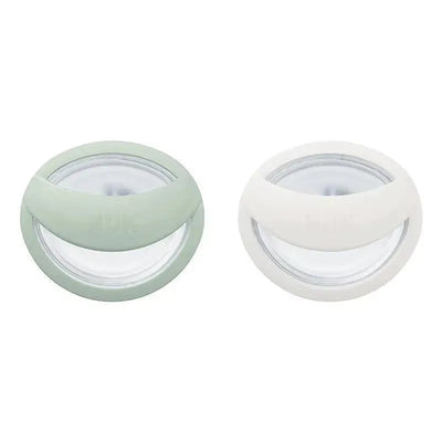 NUK For Nature Simply Natural Pacifiers in green and white, designed for infants 0 to 6 months, featuring soft silicone tips.