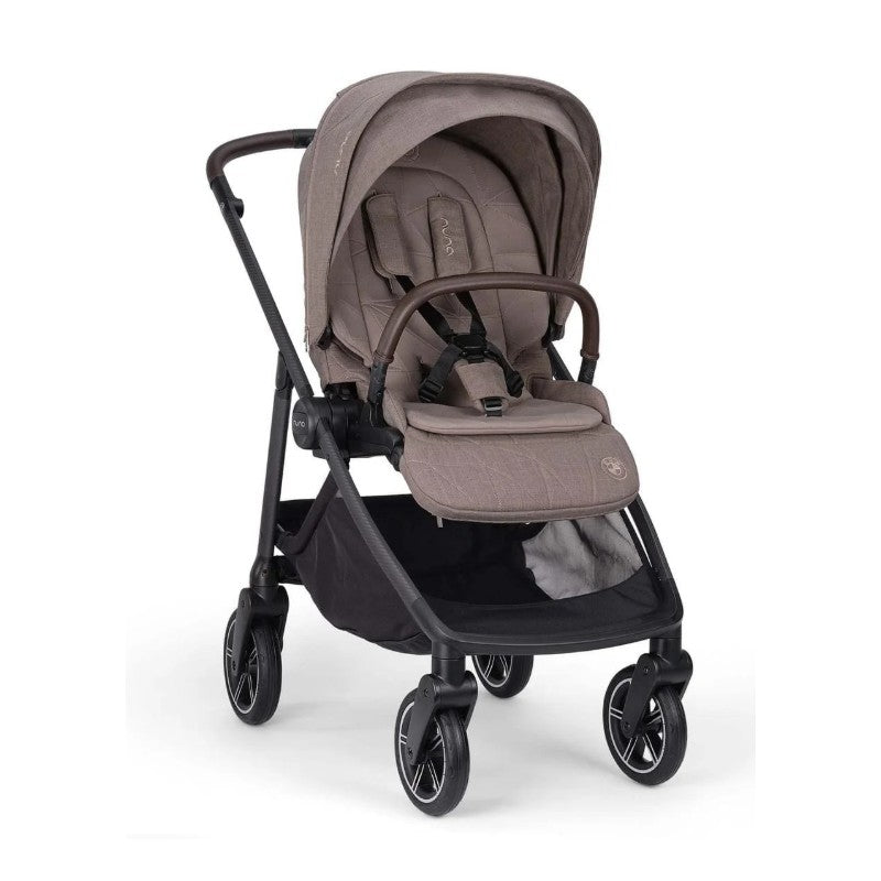 Nuna BMW Swivel Stroller in Umber, featuring a luxurious fabric seat, adjustable canopy, and large storage basket.
